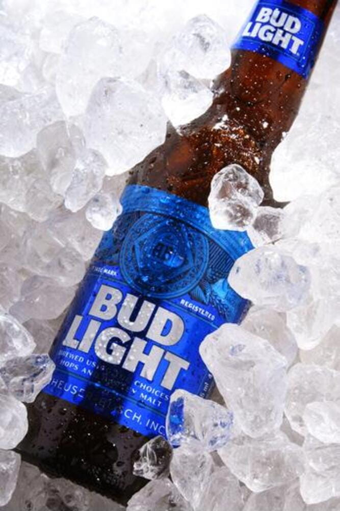 Bottle of Bud Light beer, an American light beer, produced by Anheuser-Busch, introduced in 1982. Bottle of Bud Light beer, an American light beer, produced by Anheuser-Busch, introduced in 1982.