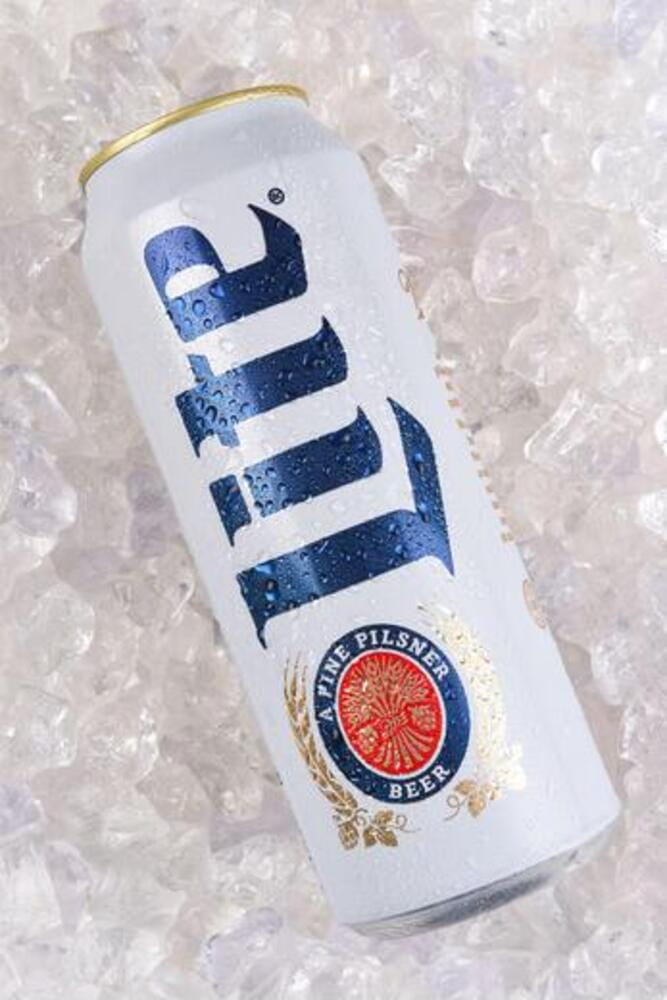 A 24 ounce king can of Miller Lite on ice. Introduced in 1975 Miller Lite was the first mainstream light beer. A 24 ounce king can of Miller Lite on ice. Introduced in 1975 Miller Lite was the first mainstream light beer.