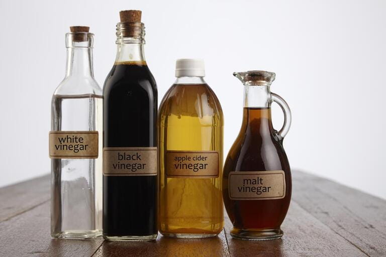 Different vinegars on wooden countertops Different vinegars on wooden countertops