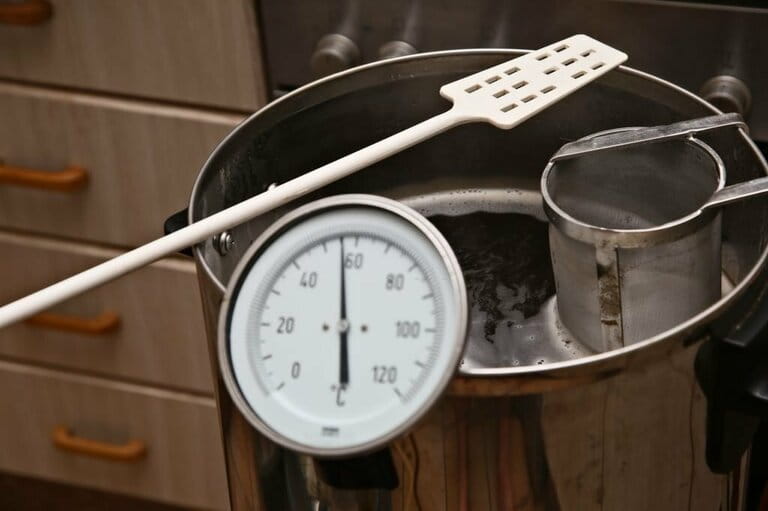 Brew craft beer in the kitchen. Concept image of home brewing beer. Brew craft beer in the kitchen. Concept image of home brewing beer.