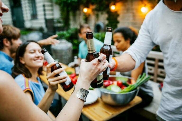 Group Of Friends Meeting Up For Barbecue Make A Toast Group Of Friends Meeting Up For Barbecue Make A Toast